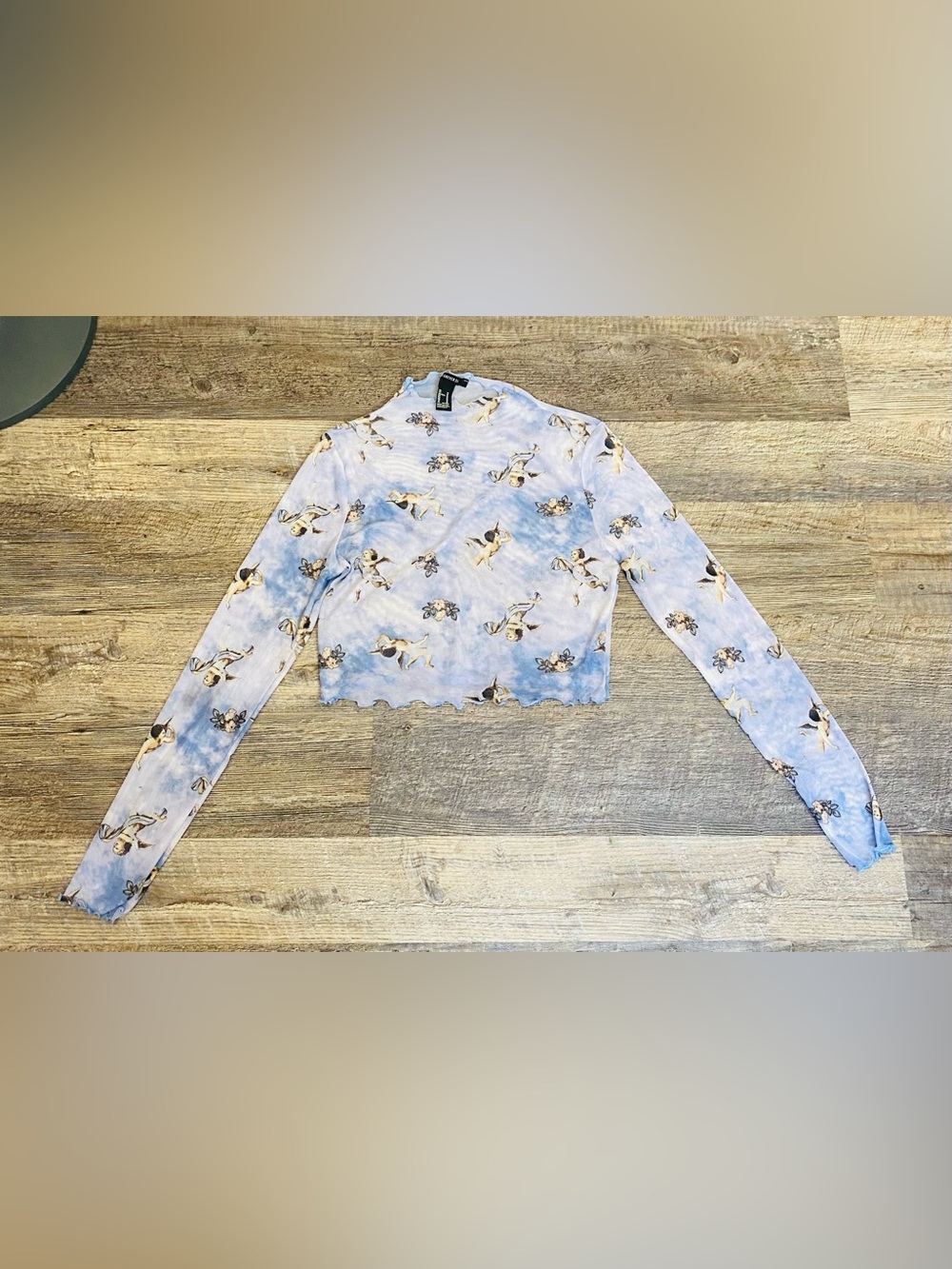 Forever 21 “Angels” top long sleeves